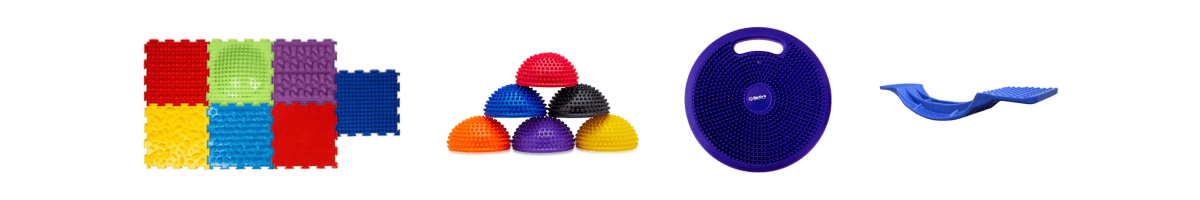 Balance sensory toys. Tactile puzzle mat, tactile balance pods, wiggle cushion and small balance board.